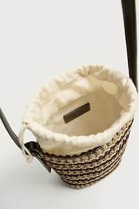 VERTICAL WOVEN CROSSBODY BAG