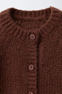 GILET EN MAILLE À FLEURS BRODÉES