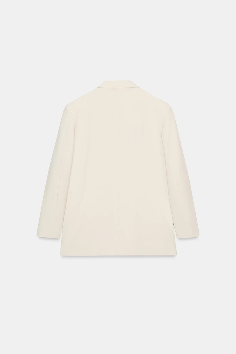 VESTE OVERSIZE À BOUTONNAGE CROIS
