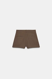 PLEATED BUTTON SHORTS