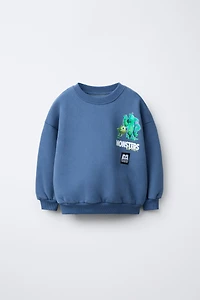 MONSTERS INC © DISNEY PIXAR PRINTED SWEATSHIRT