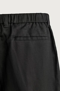 TEXTURED PLEATED SUIT SHORTS