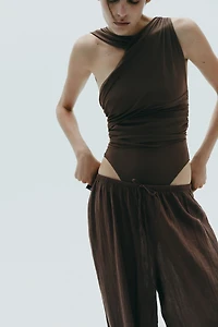 DRAPED ASYMMETRIC TULLE BODYSUIT