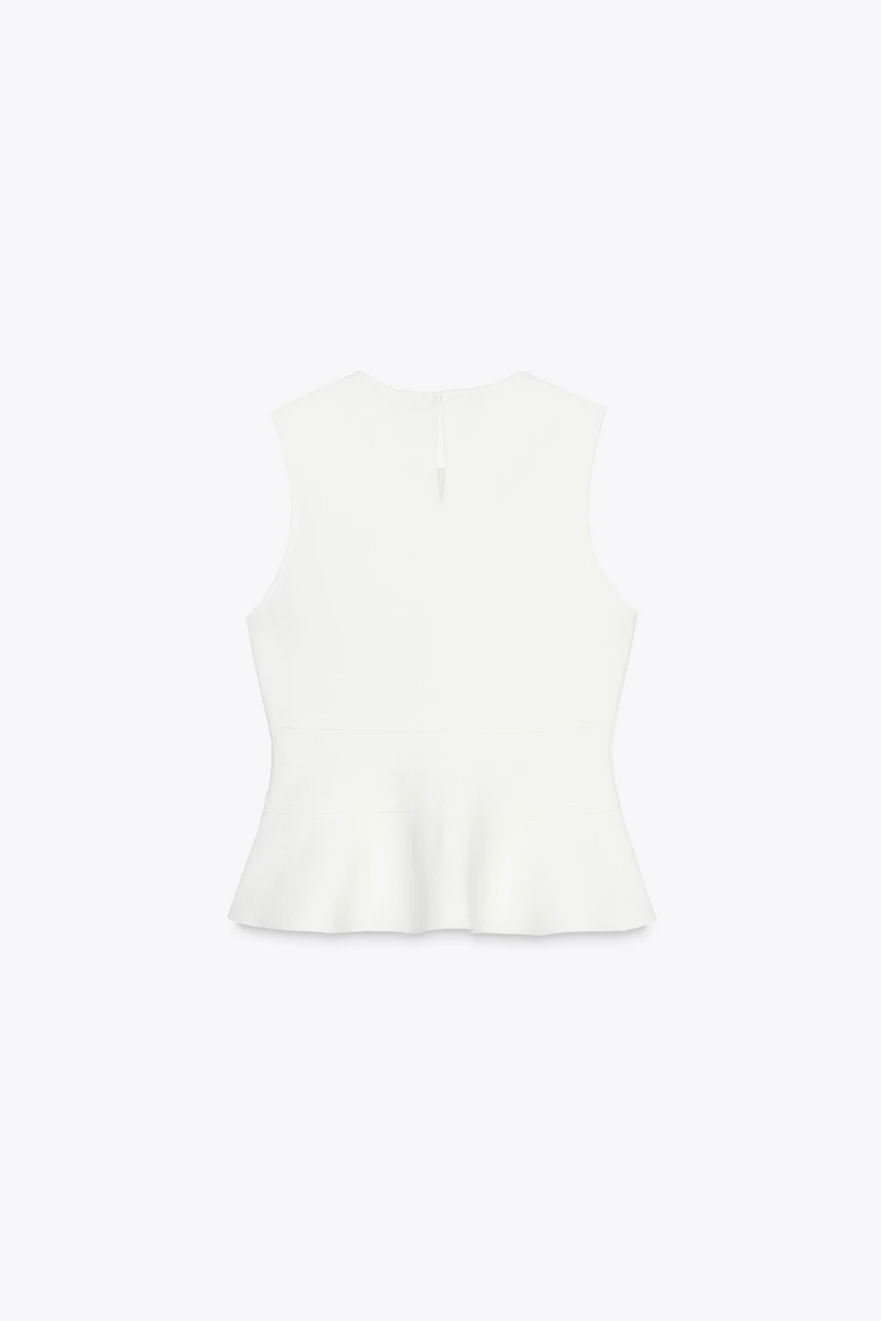 TOP EN MAILLE PÉPLUM AVEC LACETS