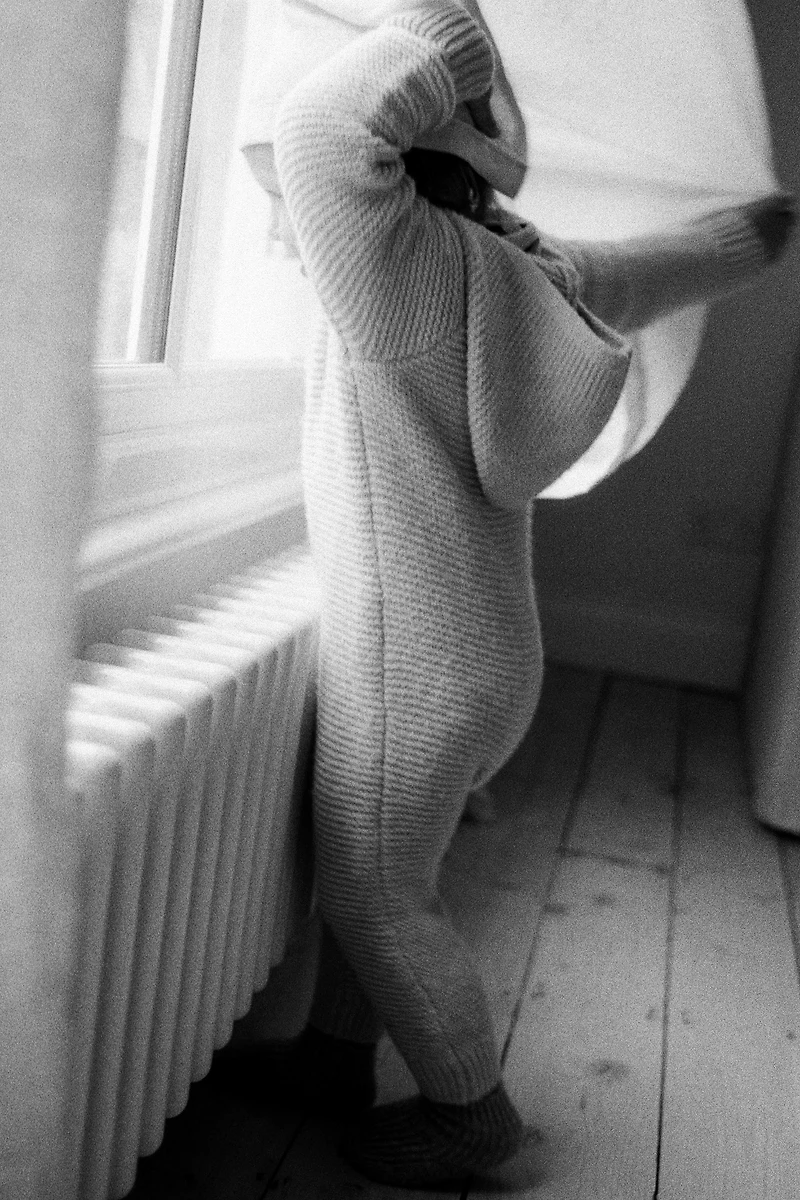 HOODED CHUNKY KNIT JUMPSUIT