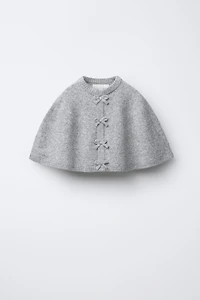 CAPE PONCHO WITH BOWS