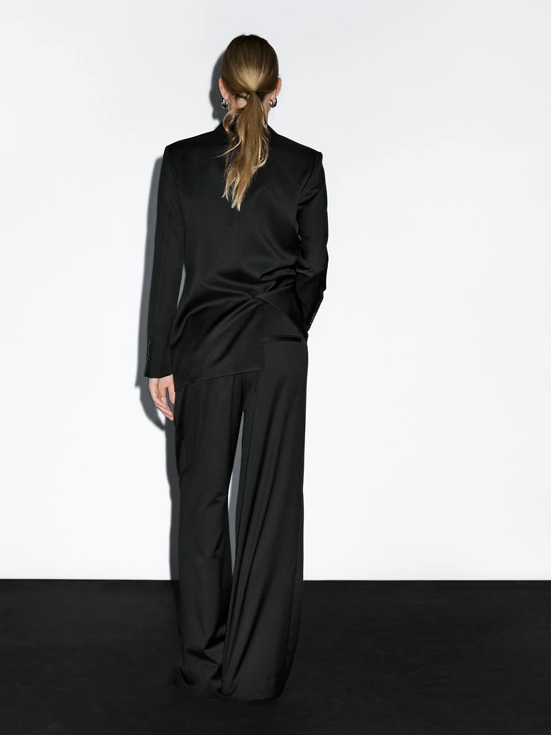 100% extra fine wool pleated trousers