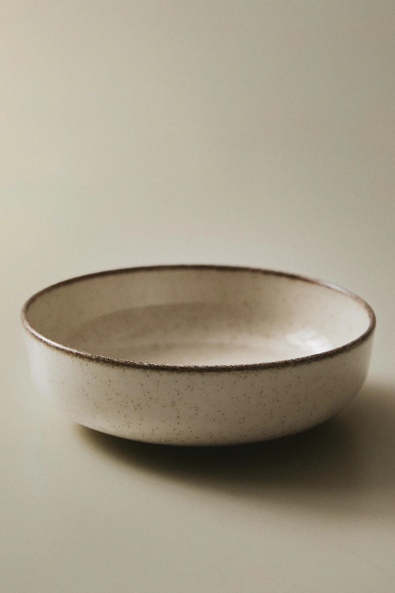 PORCELAIN BOWL WITH ANTIQUE FINISH RIM
