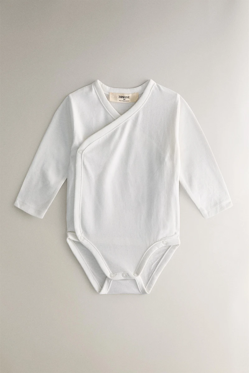 SET OF CHILDREN'S MOON BODYSUITS