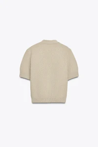 VESTE STRUCTURÉE EN MAILLE BOUTON ÉTOILE