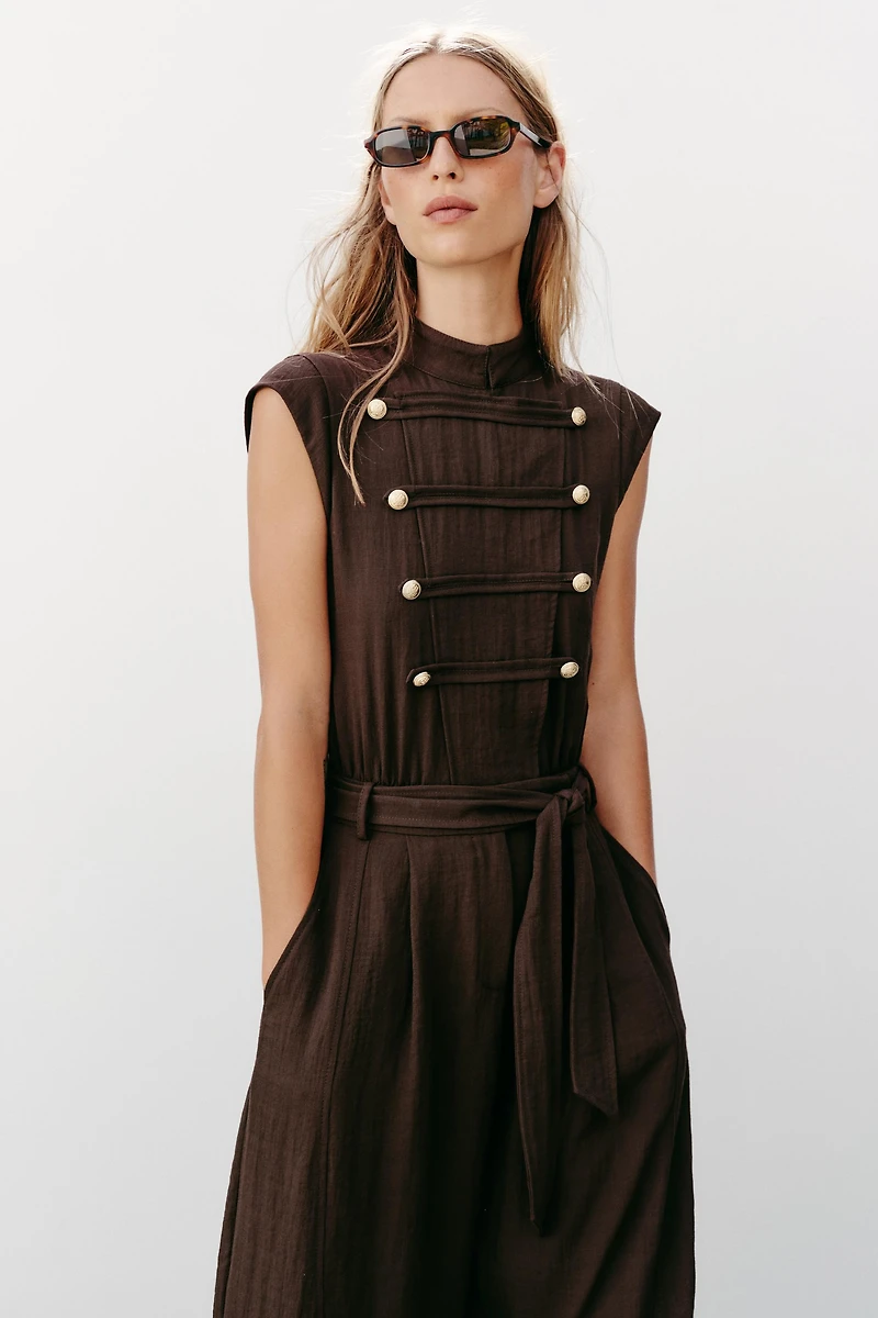 BELTED JUMPSUIT WITH BUTTON DETAILS