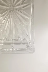 CRYSTALLINE BOTTLE WITH RAISED DESIGN