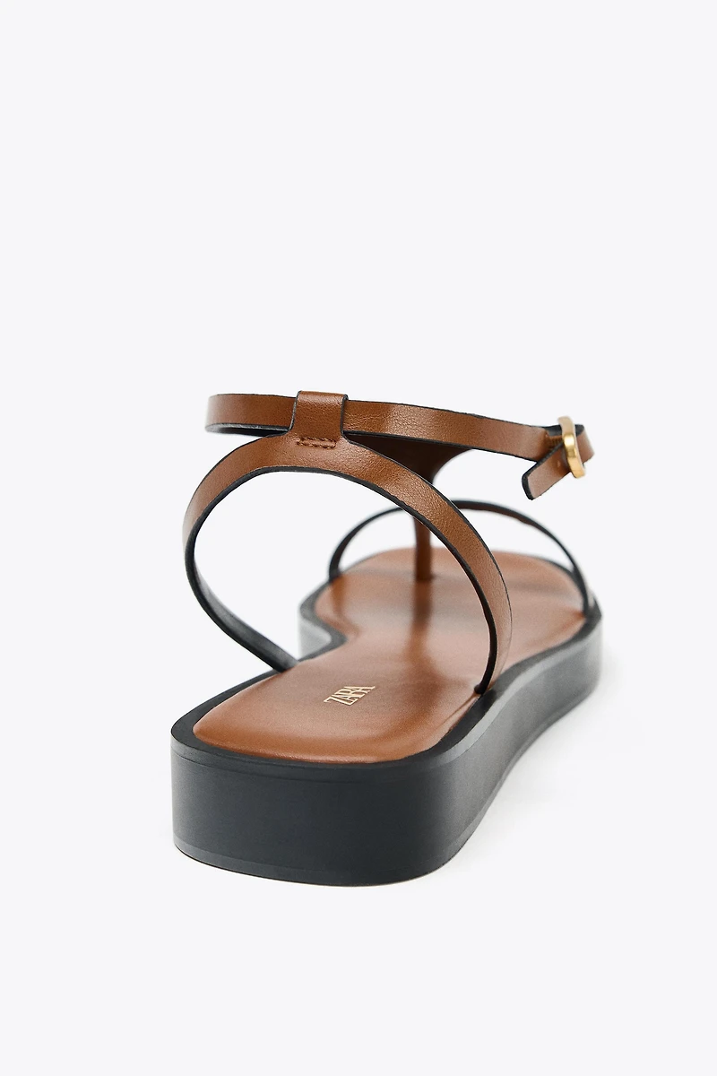 STRAPPY PLATFORM SANDALS