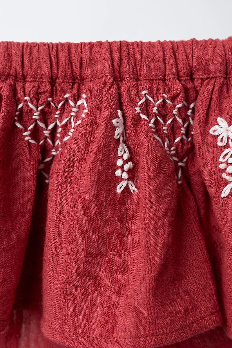 EMBROIDERED RUFFLED BOTTOMS