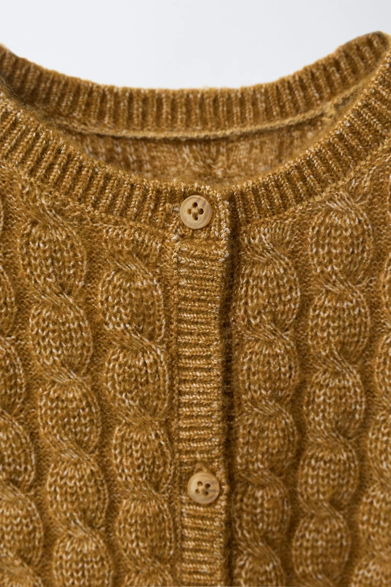 COMBINAISON LONGUE EN MAILLE TORSADÉE