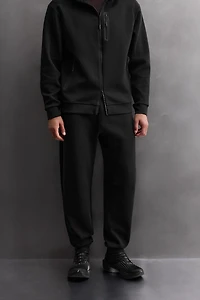 TECHNICAL ZIP PANTS