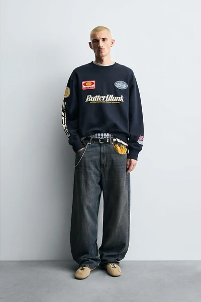 CREW NECK PATCH SWEATSHIRT