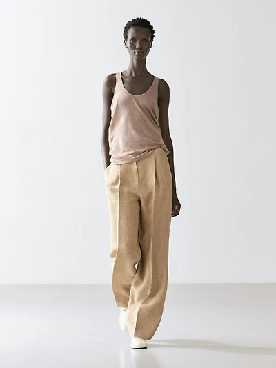 Flowing linen trousers with darts
