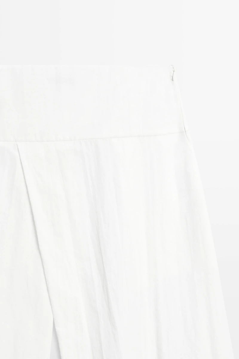 Midi skirt with yoke and pleated detail