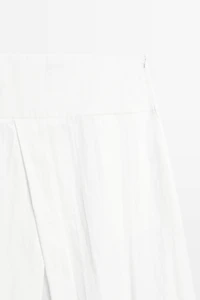 Midi skirt with yoke and pleated detail