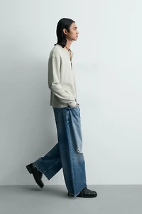 RELAXED FIT RIPPED JEANS