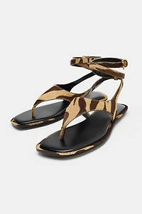 ANIMAL PRINT LEATHER SANDALS WITH FUR EFFECT