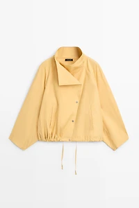 100% cotton bomber jacket with side fastening
