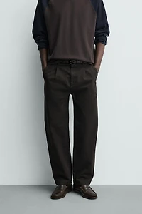 RELAXED FIT PLEATED PANTS