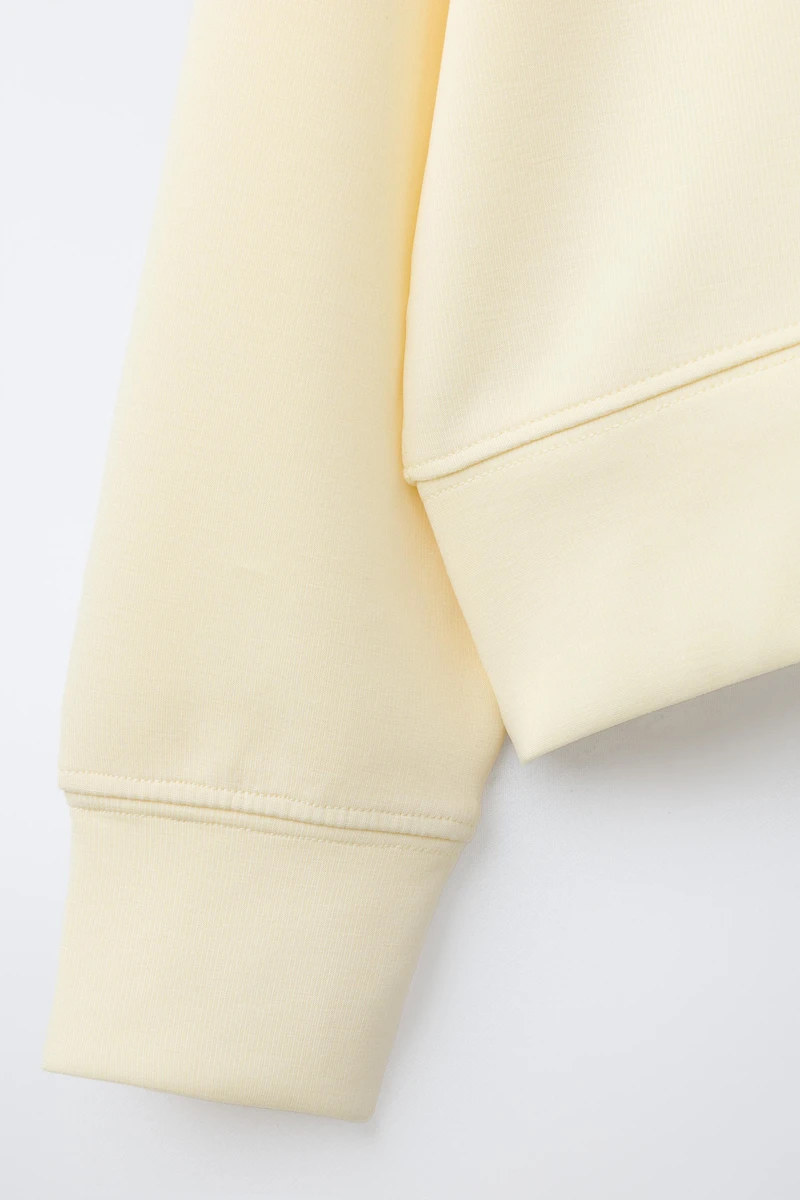 SWEAT À CAPUCHE UNI