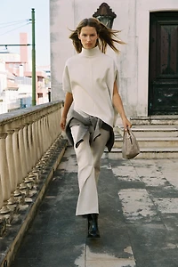 ASYMMETRIC INTERLOCK CAPE