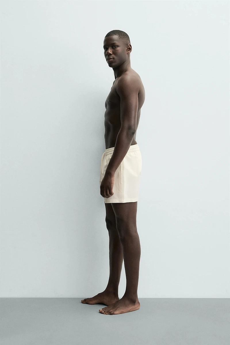 SEERSUCKER SWIM TRUNKS