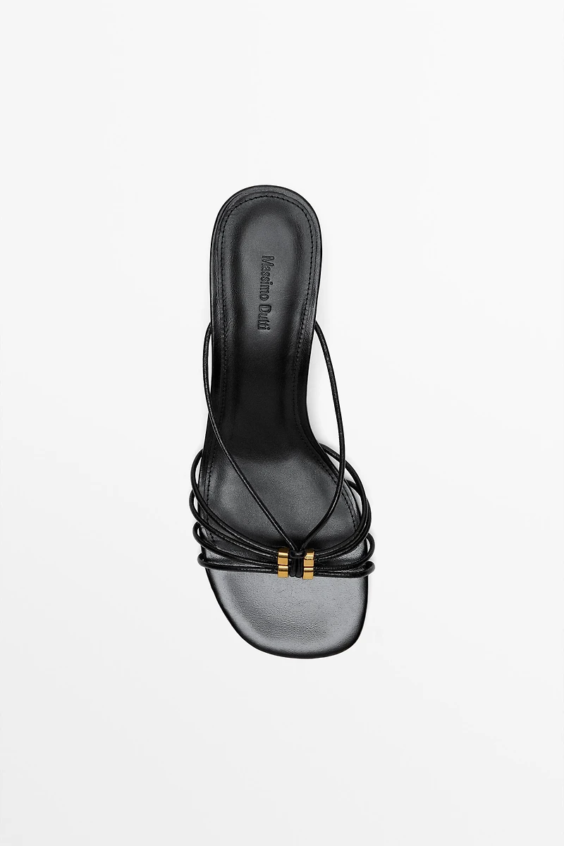 Strappy heeled sandals with embellished detail