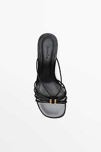Strappy heeled sandals with embellished detail