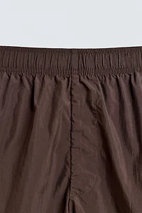 LONG CARGO SWIM TRUNKS