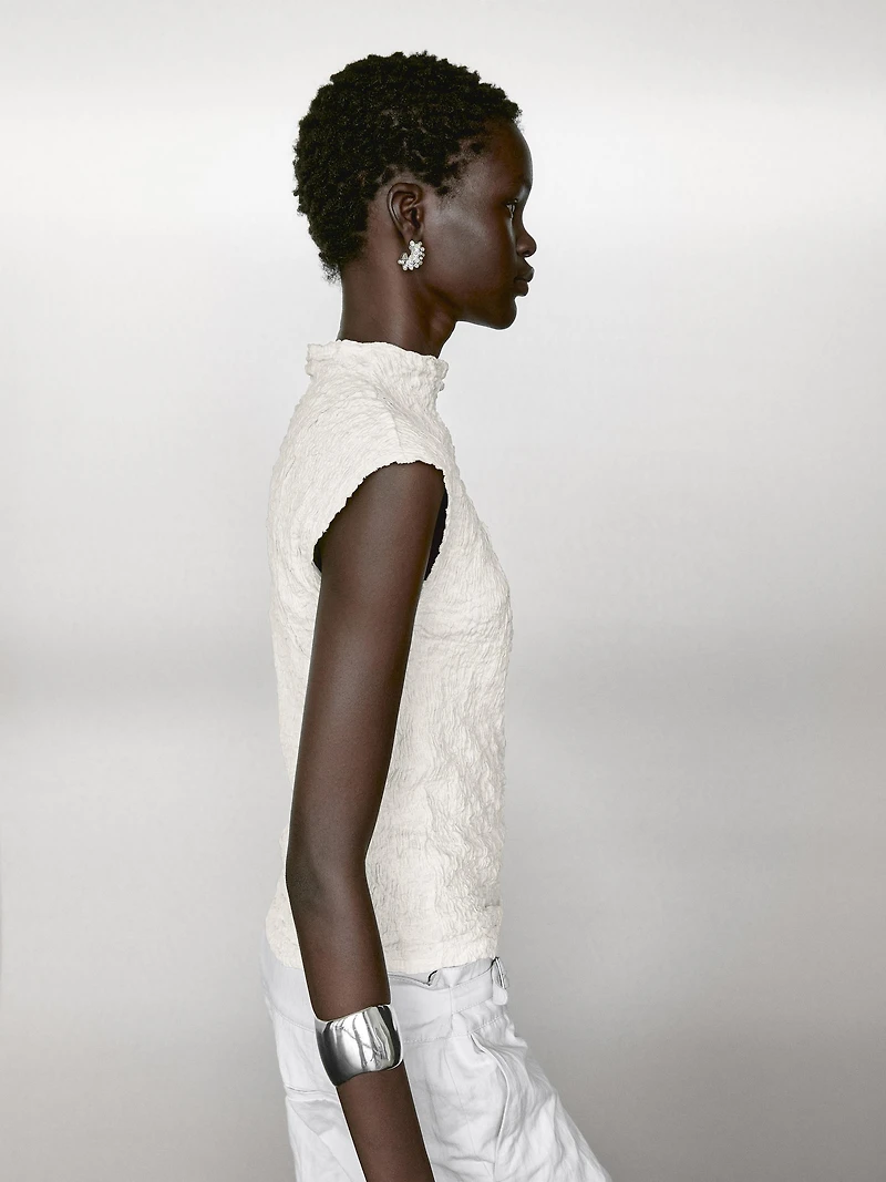 Sleeveless top with gathered detail
