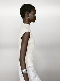 Sleeveless top with gathered detail