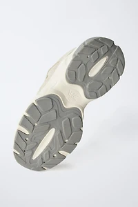 TENNIS AVEC EMPIÈCEMENTS