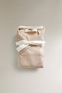 CHILDREN’S SET OF BODYSUITS