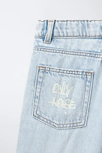 RIPPED AND GRAFFITI DENIM SHORTS
