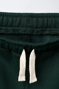 PANTALON EN MOLLETON BALLOON À INSCRIPTION