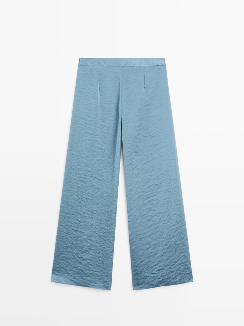 Flowing palazzo trousers with slits