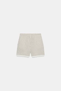DISTRESSED PLAID SHORTS