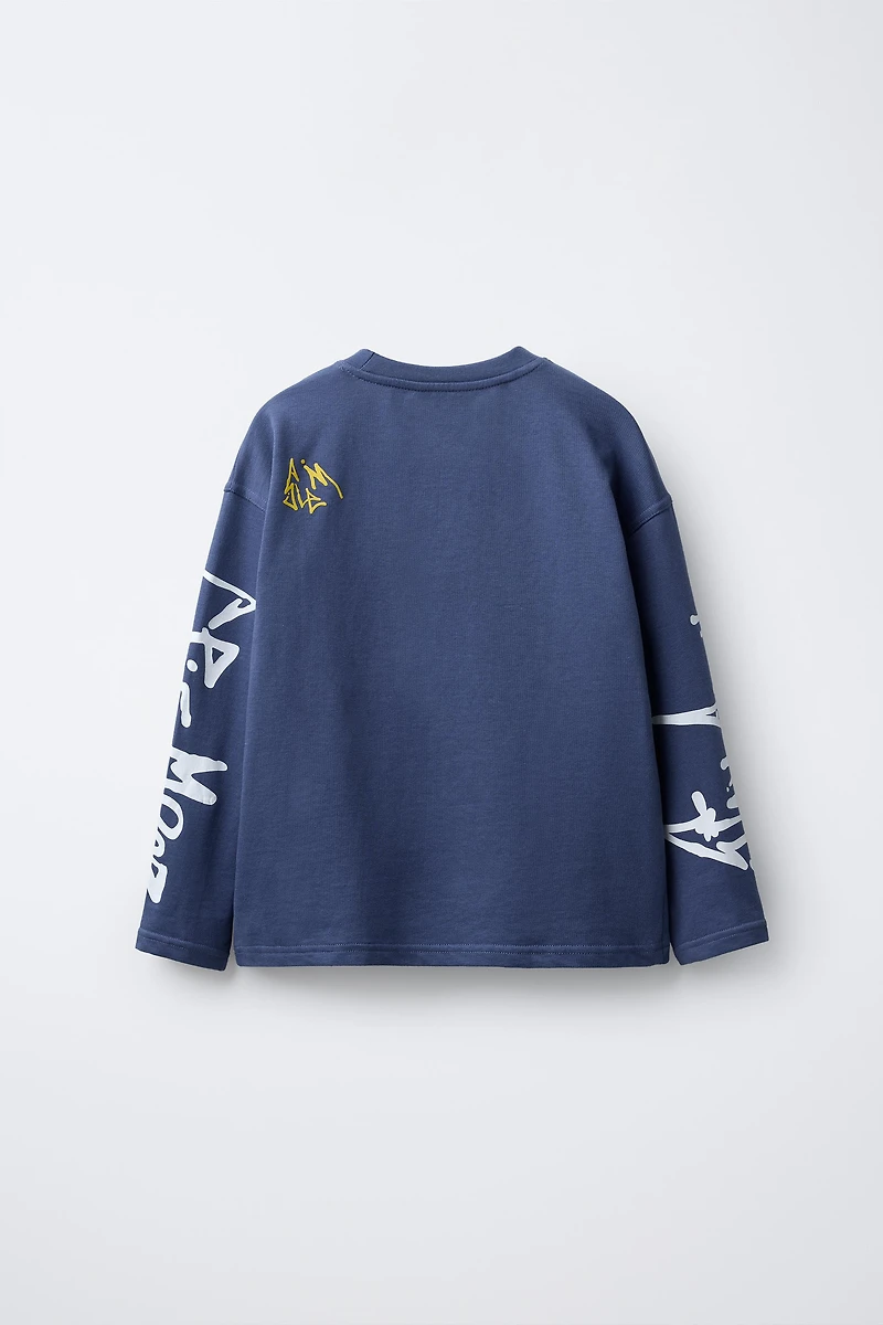 GRAFFITI LABEL DETAIL T-SHIRT