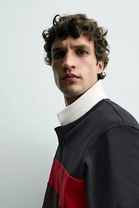 POLO À BANDES CONTRASTÉES