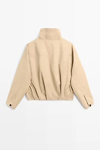 Pleated stand-collar bomber jacket