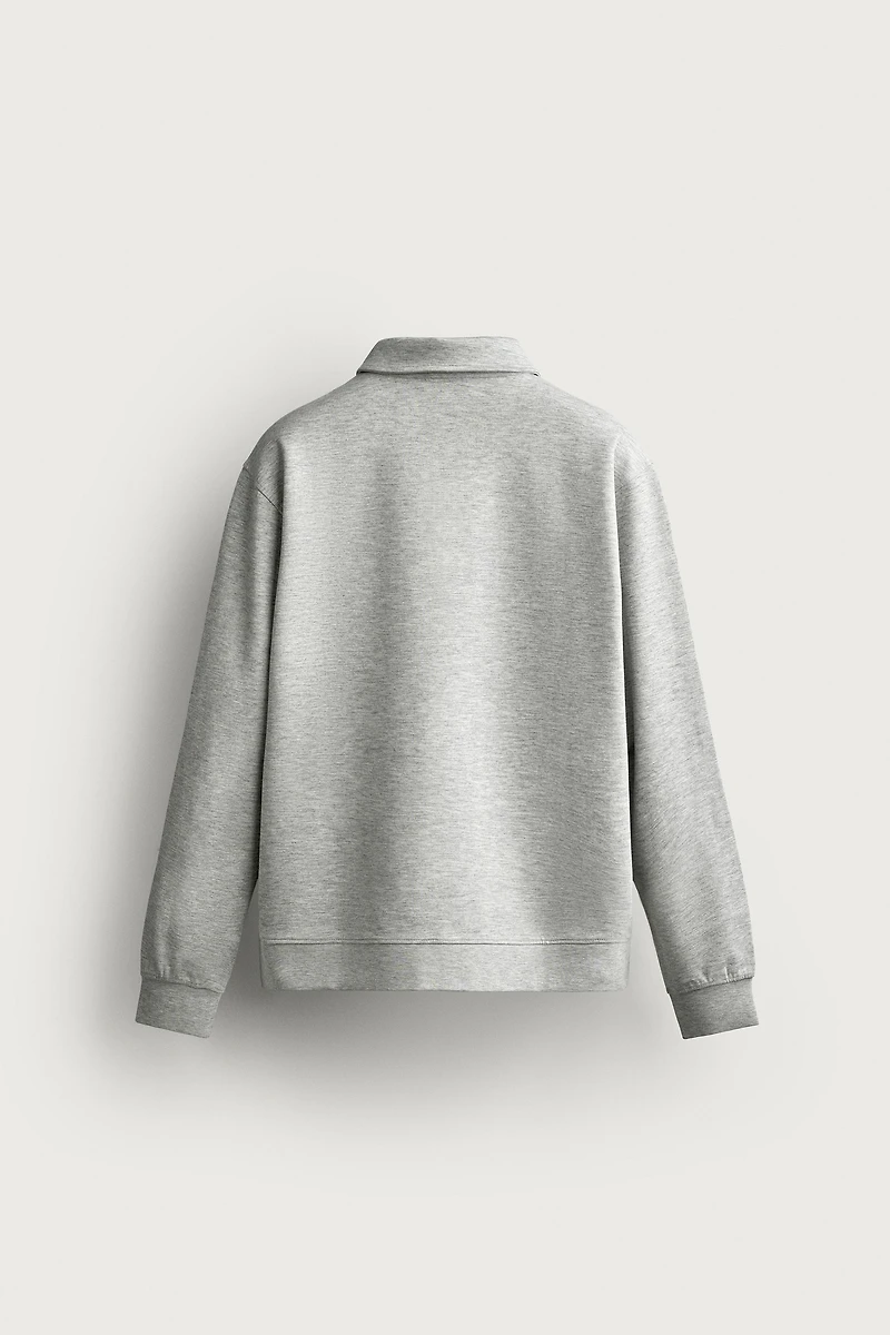 INTERLOCK ZIP POLO SWEATSHIRT