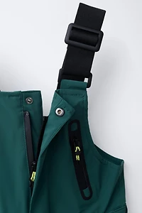 LONG WATER RESISTANT AND WINDPROOF OVERALLS RECCO® SYSTEM SKI COLLECTION