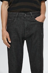Lightweight tapered fit desized jeans