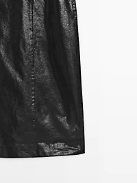 Jupe courte en cuir à imprimé animal