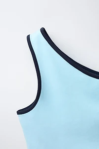 TOP ASYMÉTRIQUE LISERÉS CONTRASTE